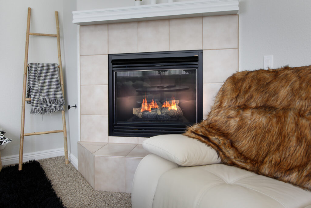 A view of a fireplace in a living room setting.